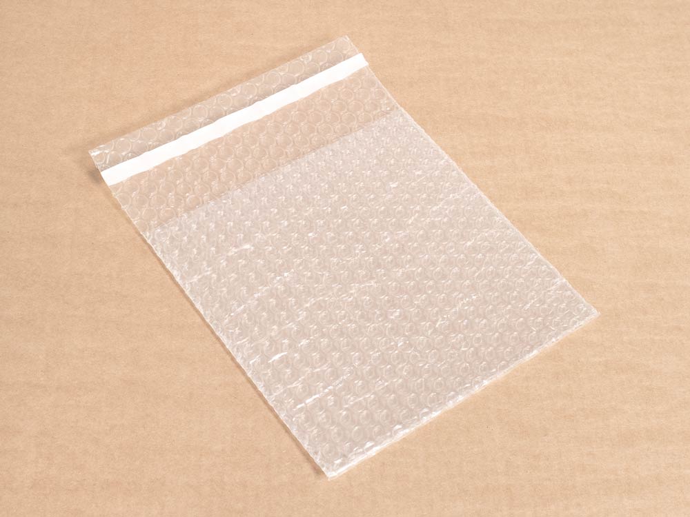 Пакет из ВПП 3-10-75 (0,20м*0,20м + клапан 0,05м с клеевым слоем )