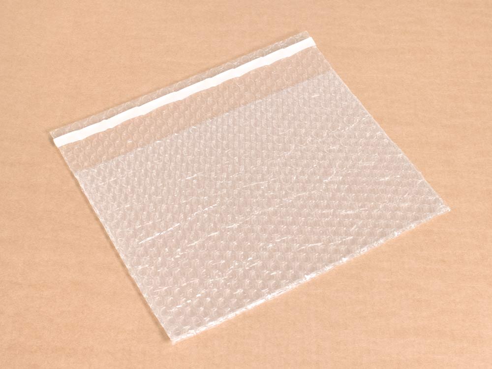 Пакет из ВПП 3-10-75 (0,30м*0,20м + клапан 0,05м с клеевым слоем )