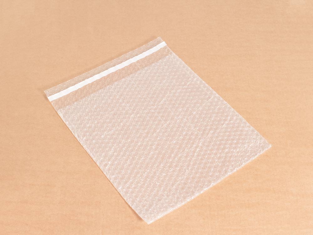 Пакет из ВПП 3-10-75 (0,30м*0,30м + клапан 0,05м с клеевым слоем )