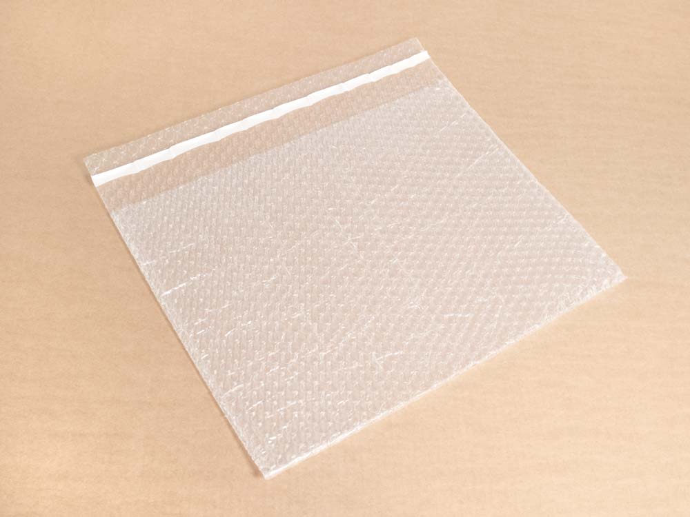 Пакет из ВПП 3-10-75 (0,40м*0,30м + клапан 0,05м с клеевым слоем )