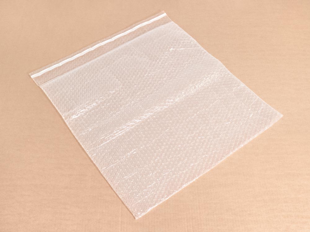 Пакет из ВПП 3-10-75 (0,50м*0,50м + клапан 0,05м с клеевым слоем )